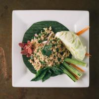 Larb Gai Salad · The traditional thai salad with finely chopped chicken breast cooked in lime dressing, red o...