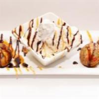 Confetti Deep Fried Oreos · 6 Confetti battered Oreo Cookies served with vanilla ice cream and drizzled with chocolate a...