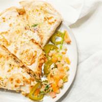 Grilled Quesadilla · Shredded chicken or steak and melted mixed cheese.