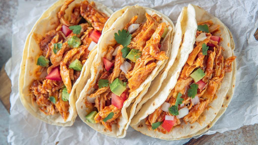 Chicken Taco · Crunchy taco filled with grilled chicken, cheese and pico de gallo.
