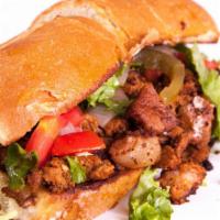 Torta · Mexican style sandwich with your choice of meat, mayo, lettuce, tomato, jalapeño slices, and...
