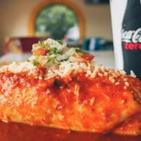 Wet And Cheesy Rancho Burrito · Choice of meat, rice, beans, salsa, onion, cilantro, cheese covered with enchilada sauce and...