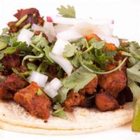 Tacos Chicos · Street style taco with grilled 4 inch soft corn tortillas, choice of meat, cilantro, onion, ...