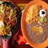 Mi Ranchito Fajitas · Beef, chicken or vegetables, sirloin strips or breast of chicken grilled with onions, tomato...
