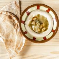 Hummus · Garbanzo beans, sesame tahini, garlic, and lemon juice.