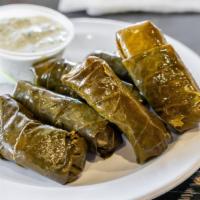 Stuffed Grape Leaves/Domade'S · six grape leaves with rice, parsley, onions