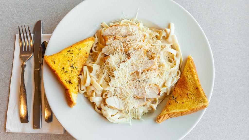 Fettuccini Alfredo · Classic fettuccini noodles mixed with a homemade garlic Parmesan sauce.