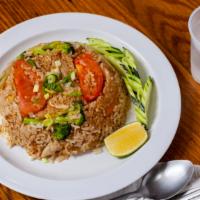 Khow Pad Thai Style · Thai style fried rice. Rice stir-fried with egg, onion, tomato, and green onion.