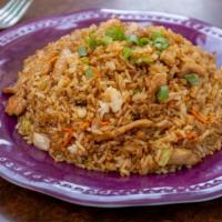 Pork Fried Rice猪肉炒饭 · this is a dish of cooked rice that has been stir-fried in a wok or a frying pan and is usual...
