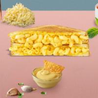 Mac Attack Grilled Cheese · Creamy classic mac and cheese with cripy bacon on two slices of buttery grilled bread.