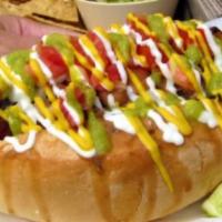 Sonoran Dog Hot · Hot dog, bun, grilled onions, avocado spread, pinto beans, tomato, fresh onions, bacon, and ...