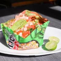 Tosti-Camaron · Served in its own bag with shrimp, cucumber, tomato, cilantro, onion, avocado, and prepared ...