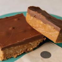 Peanut Butter And Chocolate Squares · Creamy chocolate covered peanut butter bars. Think Scotcharoo, just waaay better.