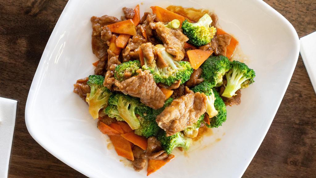 Beef With Broccoli · Tender marinated beef slices with broccoli and carrots.
