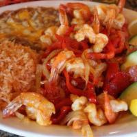 *Shrimp Fajitas · House Specialty. With Beans, Rice, Garnish, Avocado, Corn or Flour Tortillas. *Thoroughly co...