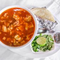Menudo · Menudo Rojo, with choice of flour or corn tortilla, along with onions and diced jalapeno.