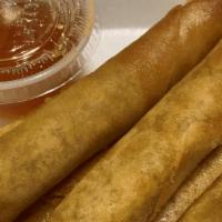 Pork Lumpias · Deep-fried ground pork, celery, carrots wrapped in wonton sheets (6 pieces).