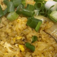 Pineapple Fried Rice · Pineapple, egg, raisin onion, green onion, yellow curry powder. bell pepper, cashew