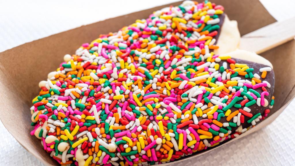 Rainbow Bright · Choice of bar dipped in chocolate, topped with rainbow sprinkles.