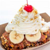 Lickity Split · A banana split on a bar!  Choice of bar dipped in choice of chocolate, rolled in peanuts, to...