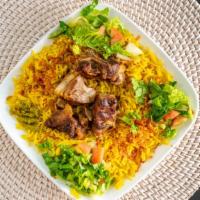 Rice With Goat Meat · Rice olive oil and goat meat.