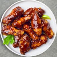 Bbq Banter Wings · Breaded or naked fresh chicken wings, fried until golden brown, and tossed in barbecue sauce...