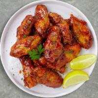 Hot Glaze Honey Wings · Breaded or naked fresh chicken wings, fried until golden brown, and tossed in honey & hot sa...