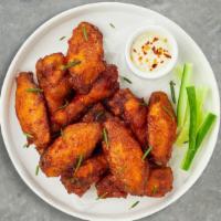 Classy Crispy Wings · Breaded or naked fresh chicken wings until golden brown. Served with a side of ranch or bleu...