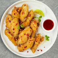 Spice It Up Wings · Breaded or naked fresh chicken wings, fried until golden brown, and tossed in sweet and sour...