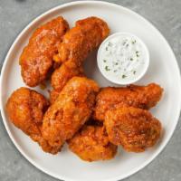 Habanero Nights Wings · Breaded or naked fresh chicken wings, fried until golden brown, and tossed in mango habanero...