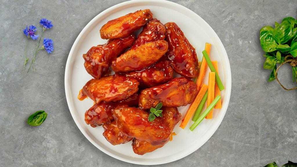 So Garlic Buffalo Wings (Boneless) · Boneless breaded naked fresh chicken wings, fried until golden brown, and tossed in garlic and buffalo sauce. Served with a side of ranch or bleu cheese.