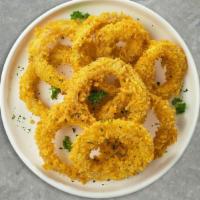 On And Onion Rings · Sliced onions dipped in a light batter and fried until crispy and golden brown.