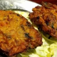 Aloo Tikki · Vegan. Deep fried round shaped potato patties with mild spice.