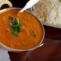 Chicken Makhani · Boneless chicken cooked with onions, garlic, ginger, tomatoes, butter, cream and curry spice...