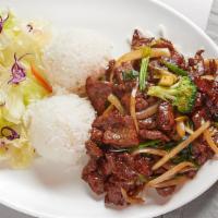 Mongolian Beef · Sliced beef with onion, green onion, fried rice noodles.