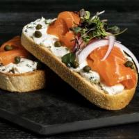 Smoked Salmon Toast · Smoked Salmon, cream cheese, dill, capers, on crispy sourdough bread.