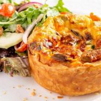 Quiche - Roasted Artichoke & Creamed Spinach · Scratch made quiche in house, baked fresh daily and served with a side salad or fruit. Flavo...