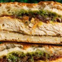 Chicken Pesto Panini · Roasted tomato jam with housemade pesto with provolone cheese and grilled chicken breast. On...