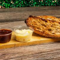 Toast & Jam · Multigrain crispy toast with our house made jam and orange blossom butter. GF bread option