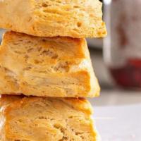 Biscuit Basket (V) · Flaky, moist biscuits served with maple butter & homemade strawberry balsamic jam. Served 3 ...