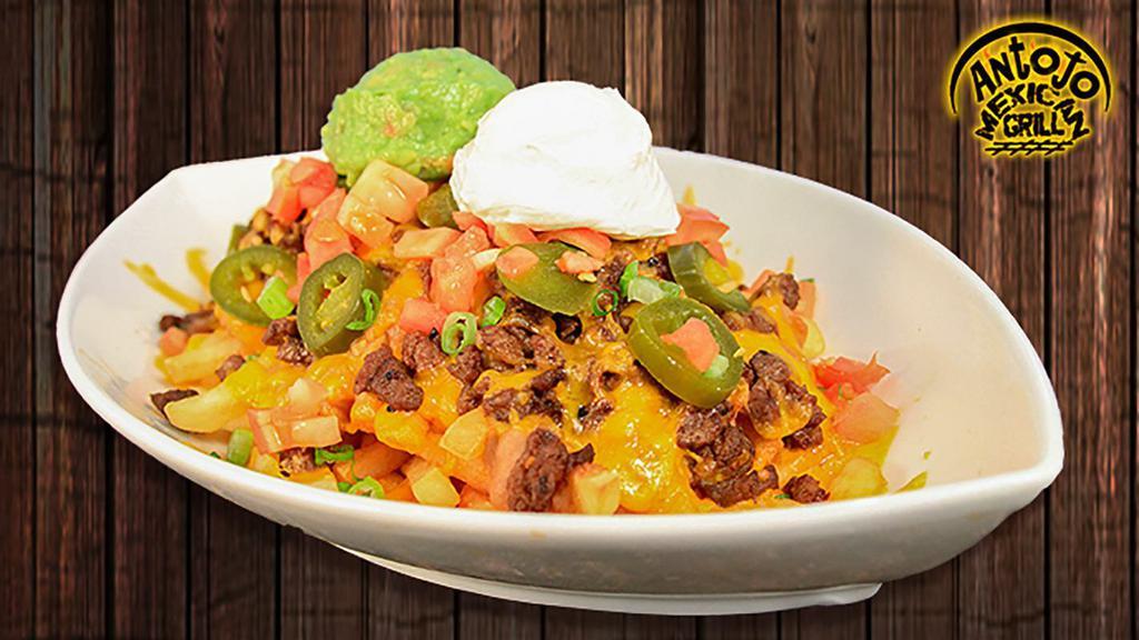 Carne Asada Nacho Fries via Antojo Mexican Grill