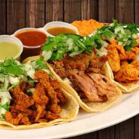 Tacos Callejeros · Three soft tacos with your choice of meat served with cilantro, onion and salsa. Served with...
