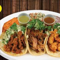 Combo #71 Taco Plate · Three soft tacos with meat choice served with cilantro, onion and salsa. Served with rice an...