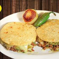 Combo #68 Two Mulitas · Two soft corn tortillas with cheese, your choice of meat, onions, cilantro, salsa and guacam...