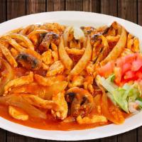 Arroz Con Pollo · Chicken cooked in a light sauce with mushrooms, onions and spices. Placed on a bed of rice. ...