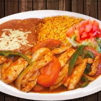 Pollo Ranchero · Chicken breast strips, onions, tomato, red and green bell peppers in a spicy and very tasty ...
