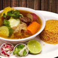 Caldo De Res · A favorite! This traditional Mexican broth is cooked with generous tender pieces of beef, zu...