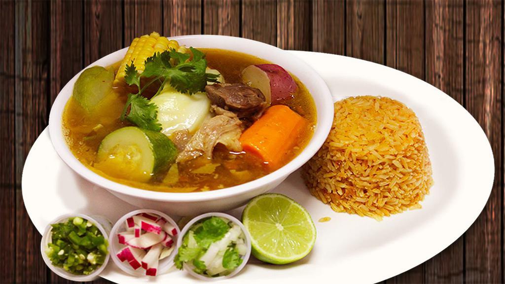 Caldo De Res · A favorite! This traditional Mexican broth is cooked with generous tender pieces of beef, zucchini, chayote, carrots, potatoes, cilantro and other spices. Beans are not included.