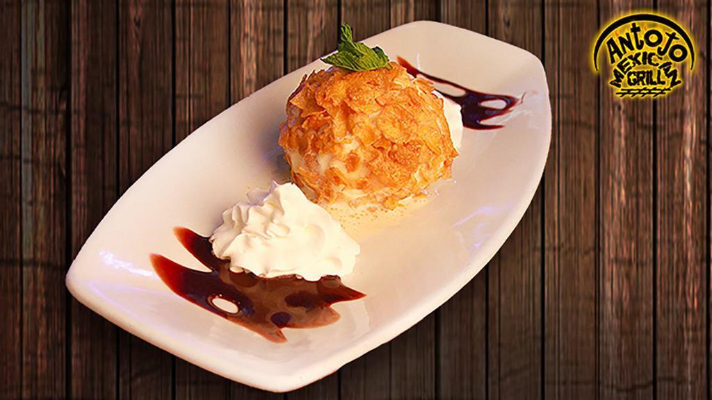 Fried Ice Cream · A breaded scoop of vanilla ice cream, quickly deep-fried, served with chocolate sauce, whipped cream and garnished with a mint leaf.