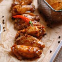 Spicy Fried Wings · 8 juicy chicken wings flavored with hot spices.